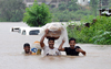 Heavy rainfall causes floods, traffic blocks, and landslides